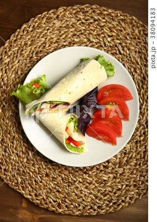 Shawarma, roll with chicken, salad in pita bread 38094183