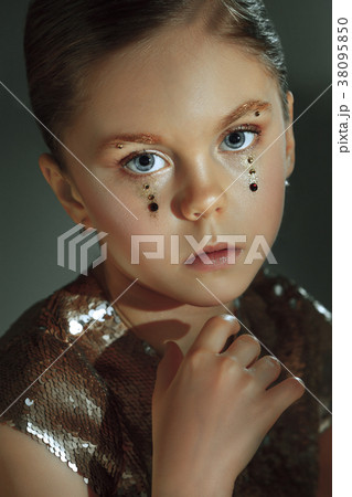 The fashion portrait of young beautiful teen girl The fashion portrait of young beautiful teen girl 38095850