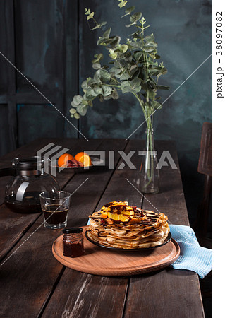 Fresh homemade french crepes made with eggs, milk Fresh homemade french crepes made with eggs, milk 38097082