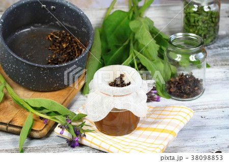 Alternative medicine, filtering comfrey ointment Alternative medicine, filtering comfrey ointment 38098853