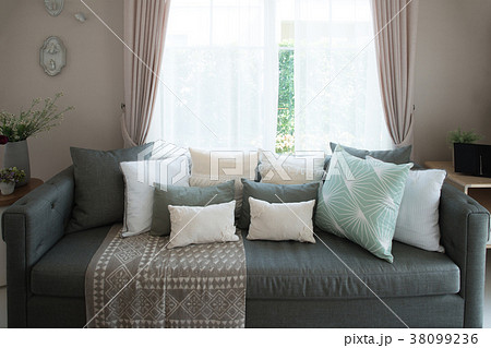 Lounge sofa and colorful pillow in lounge  38099236