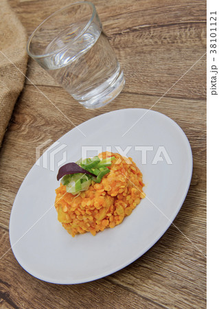 Lentil salad with Indian spice on a table Lentil salad with Indian spice on a table 38101121