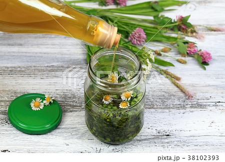 Herbal organic oil made from herbs and olive oil Herbal organic oil made from herbs and olive oil 38102393