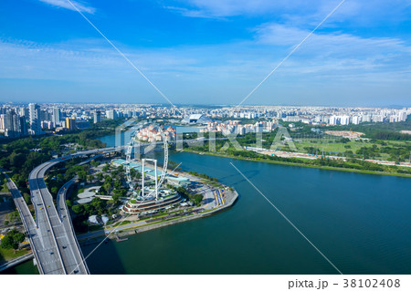 Panorama of Singapore and Ferris Wheel. Aerial 38102408