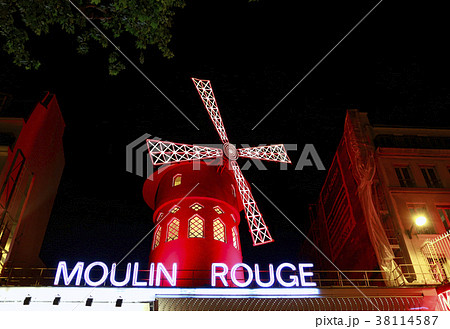 View of the Moulin Rouge at night in Paris, France 38114587