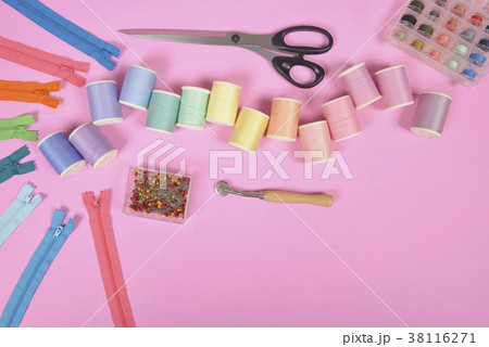 Flat lay of sewing material and accessories 38116271