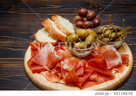 Meat plate of Italian prosciutto crudo or spanish 38116639