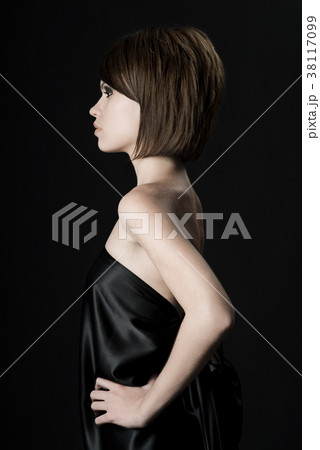 Fashionable woman black background 38117099