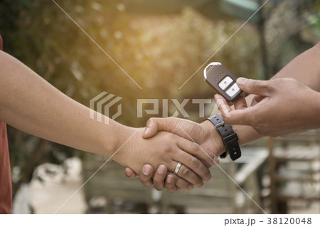 Man shaking hand after success deal Man shaking hand after success deal 38120048