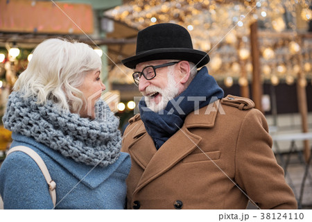 Happy old friends meeting in city 38124110