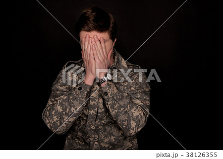 Upset military man feeling helpless 38126355