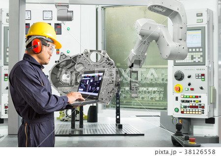 Engineer use computer control robot industry 38126558