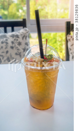 cocktail with fresh sliced fruits cocktail with fresh sliced fruits 38129836