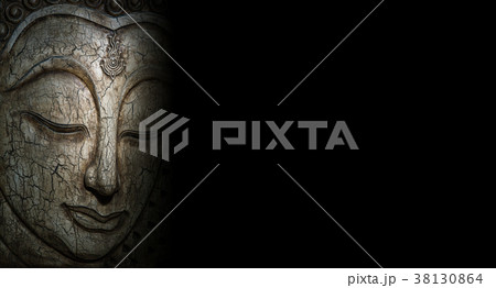 Buddha faces carved out of wood Buddha faces carved out of wood 38130864