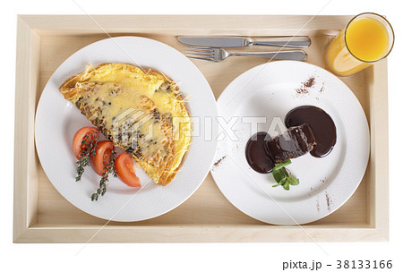 Omelet with dessert and juice. Omelet with dessert and juice. 38133166