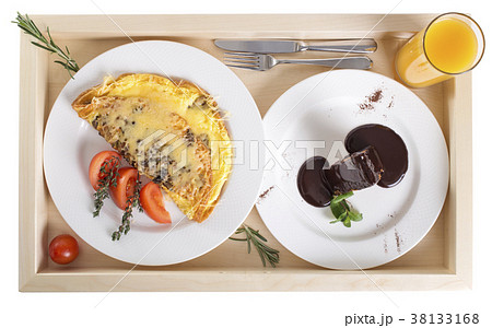 Omelet with dessert and juice. Omelet with dessert and juice. 38133168