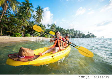 Asian kid to play Kayak on the beach on Koh Kood 38133219