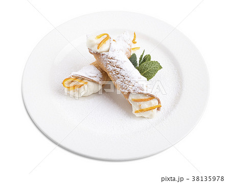 Sicilian cannoli with ricotta. 38135978