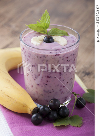 Smoothie of  banana and black currant  . 38141837