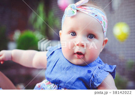 the portrait of a six-month-old child rejoices the portrait of a six-month-old child rejoices 38142022