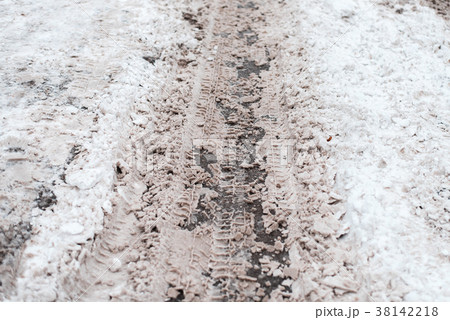 Winter road traces of wheels on snow. Outside the 38142218
