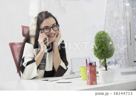 Single happy female business owner with smile and Single happy female business owner with smile and 38144713