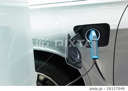 Charging an electric car, Future of transportation Charging an electric car, Future of transportation 38157046
