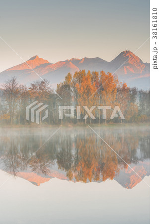 Stunning high peak reflection in lake Stunning high peak reflection in lake 38161810