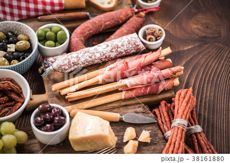 Spanish meat selection on wooden table 38161880