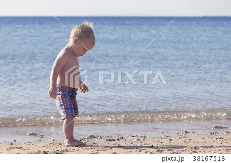 Cute toddler on the beach. Copy space Cute toddler on the beach. Copy space 38167518