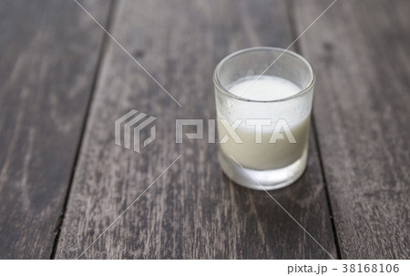 Small glass of organic plain yogurt Small glass of organic plain yogurt 38168106