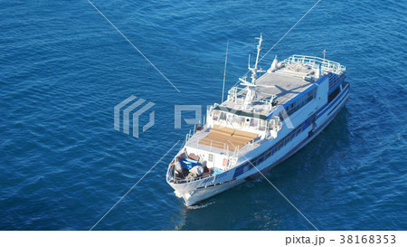 Aerial shot of luxury boat sailing in a blue sea Aerial shot of luxury boat sailing in a blue sea 38168353
