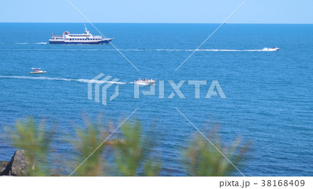 Cruise ship, yachts and catamarans moving through 38168409