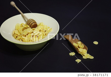 Corn flakes in a plate. Breakfast from flakes with Corn flakes in a plate. Breakfast from flakes with 38171171