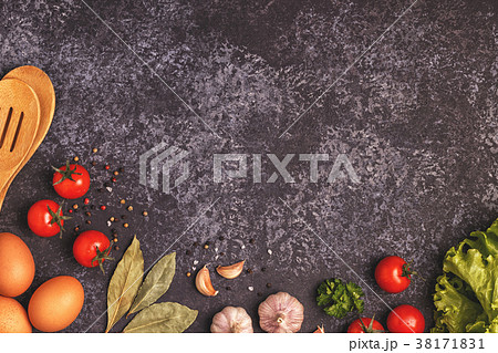 Ingredients for cooking on dark background. 38171831