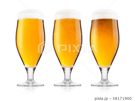 Cold glasses of lager beer with foam and dew 38171900