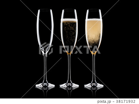 Elegant glasses of yellow champagne with bubbles 38171932
