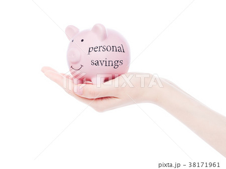 Female hand holds piggy bank personal savings Female hand holds piggy bank personal savings 38171961