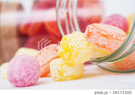 traditional candies in transparent glass container traditional candies in transparent glass container 38173300