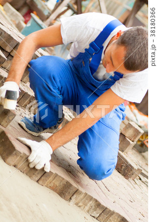 laying paving slabs on city square, repairing 38180366