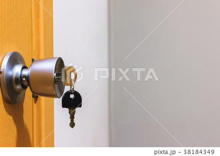 Key in keyhole on door 38184349