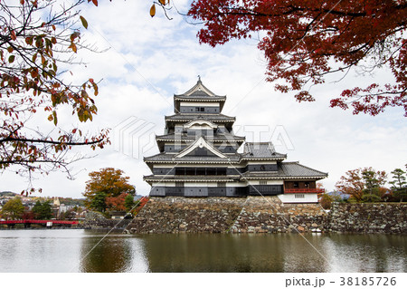 Ancient Japanese Castle with cloudy sky in Autumn. Ancient Japanese Castle with cloudy sky in Autumn. 38185726