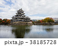Ancient Japanese Castle with cloudy sky in Autumn. 38185728