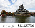Ancient Japanese Castle with cloudy sky in Autumn. 38185730