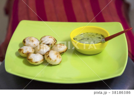 APPE, South Indian delicacy with spicy sauce 38186386