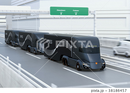高速道路に縦列走行している黒色の自動運転電動トラック 38186457