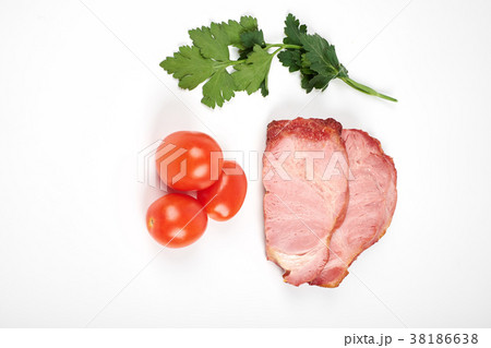 roasted pork slices and tomatoes isolated on white 38186638