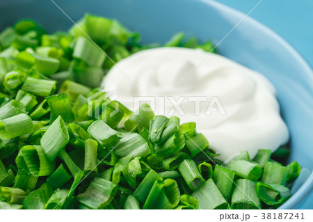 Sliced green onions or scallions in a bowl Sliced green onions or scallions in a bowl 38187241
