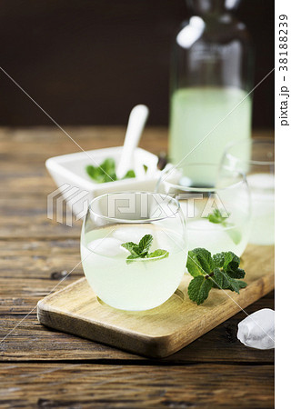 Summer cocktail with rum, ice and mint Summer cocktail with rum, ice and mint 38188239