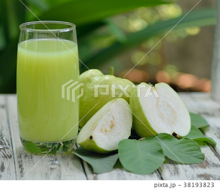 Guava juice and fresh Guava on wooden  38193823